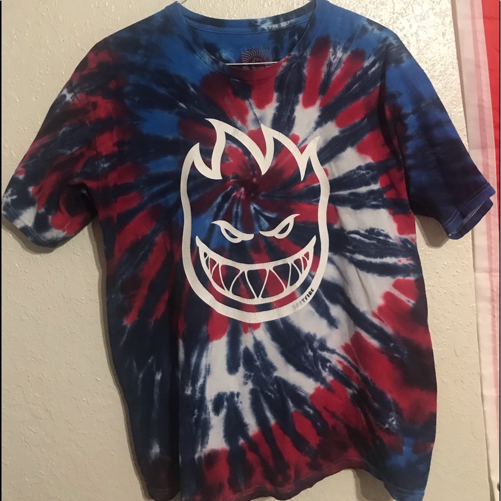 red, blue, and white “spitfire” t-shirt
